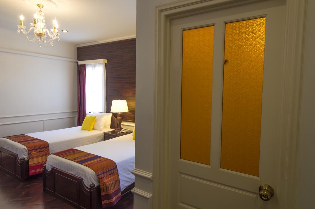 Le Bouton D'Or Boutique Hotel Thakhek Habitación foto
